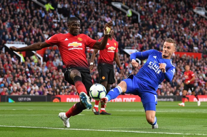 Eric Bailly of Manchester United and James Maddison of Leicester City battle for possession during the Premier League match between Manchester United and Leicester City at Old Trafford