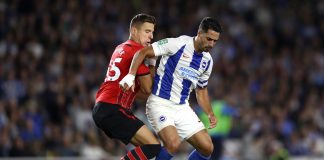 Beram Kayal of Brighton and Hove Albion is challenged by Jan Bednarek of Southampton during the Carabao Cup Second Round match