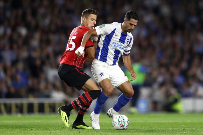 Beram Kayal of Brighton and Hove Albion is challenged by Jan Bednarek of Southampton during the Carabao Cup Second Round match