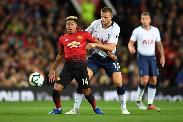 Jesse Lingard of Manchester United and Eric Dier of Tottenham Hotspur battle for possession during the Premier League match between Manchester United and Tottenham Hotspur
