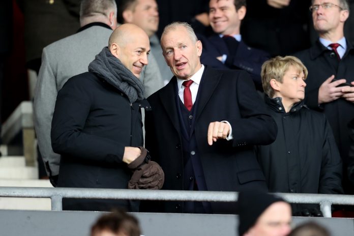 Chief Executive of Arsenal Ivan Gazidis speaks with Chairman of Southampton Ralph Krueger during the Premier League match between Southampton and Arsenal at St Mary's Stadium