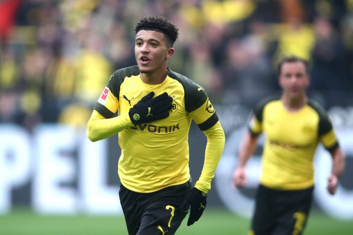 Jadon Sancho of Borussia Dortmund celebrates after scoring his team's first goal during the Bundesliga match between Borussia Dortmund and 1. FSV Mainz 05 Jadon Sancho of Borussia Dortmund celebrates after scoring his team's first goal during the Bundesliga match between Borussia Dortmund and 1. FSV Mainz 05