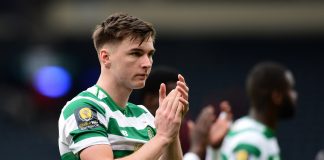 Kieran Tierney of Celtic applauds the fans