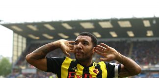 Troy Deeney of Watford celebrates after scoring his sides second goal during the Premier League match between Burnley FC and Watford FC at Turf Moor