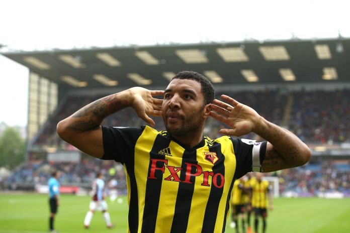 Troy Deeney of Watford celebrates after scoring his sides second goal during the Premier League match between Burnley FC and Watford FC at Turf Moor